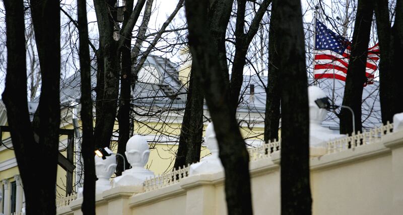 The US flag flies behind a fence at the embassy in Minsk, capital of Belarus. AFP