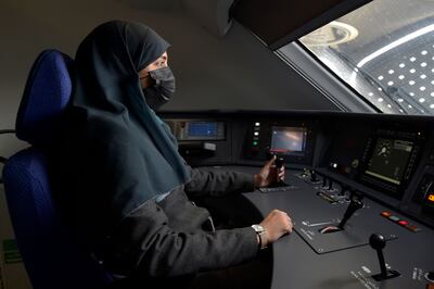 Saudi conductor Raneem Azzouz, drives a high-speed train ferrying pilgrims to Mecca, in Saudi Arabia's Red Sea coastal city of Jeddah AFP