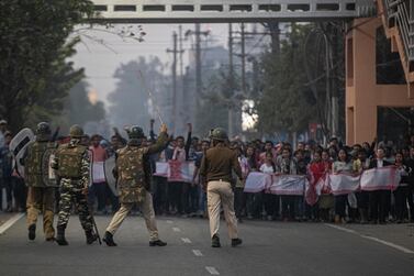 Indian police and paramilitary personnel stop protesters in Guwahati, capital of Assam state, on December 12, 2019. AP Photo