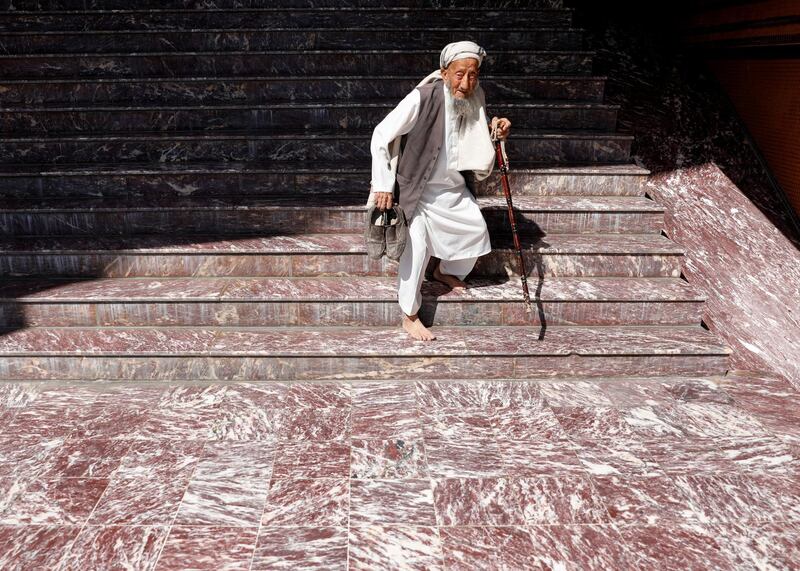 An Afghan man leaves after prayers during Eid Al-Fitr at a mosque in Kabul, Afghanistan. REUTERS