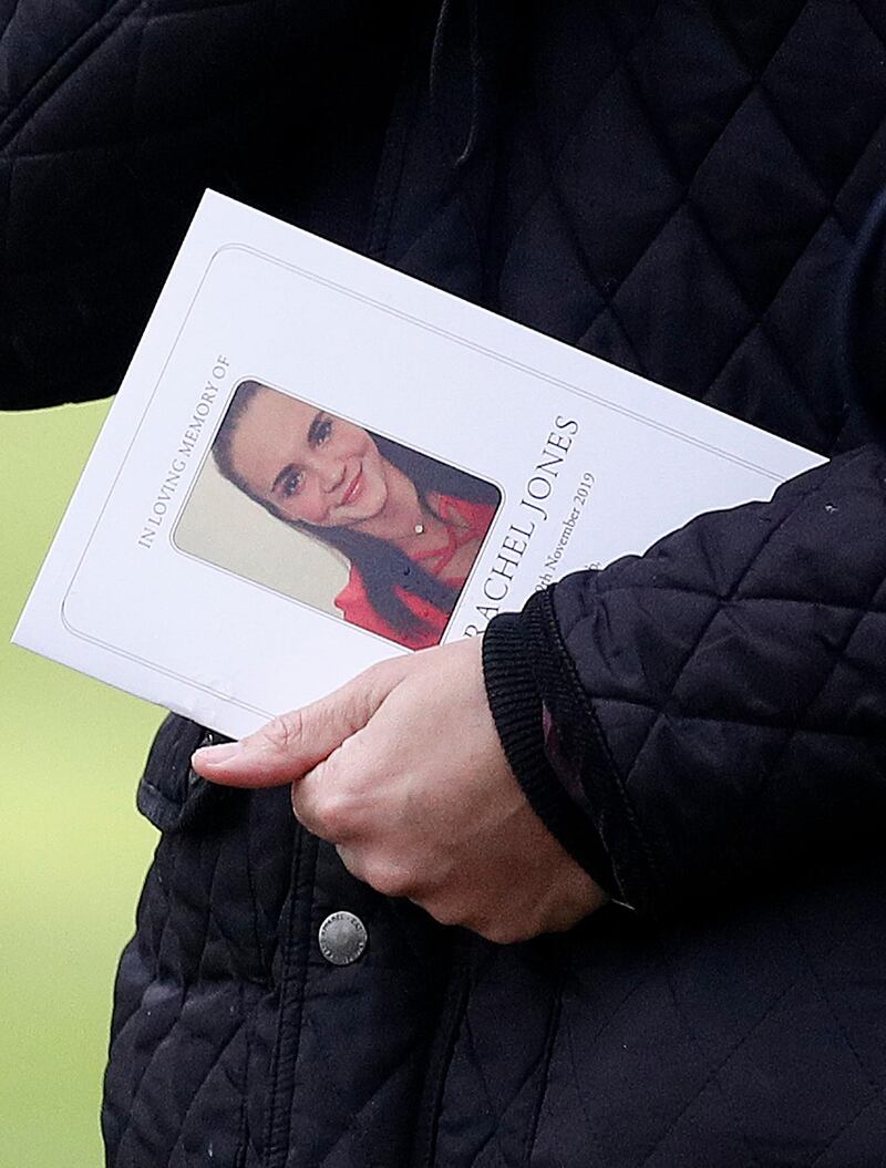 STRATFORD-UPON-AVON, ENGLAND - DECEMBER 20: A mourner carries an order of service after a memorial service to celebrate the life of Saskia Jones at Holy Trinity Church on December 20, 2019 in Stratford-upon-Avon, England. Saskia Jones was killed alongside fellow Cambridge graduate Jack Merritt by Usman Khan as they helped organise a prisoner rehabilitation event at Fishmongers Hall in London on 29th of November. (Photo by Darren Staples/Getty Images)