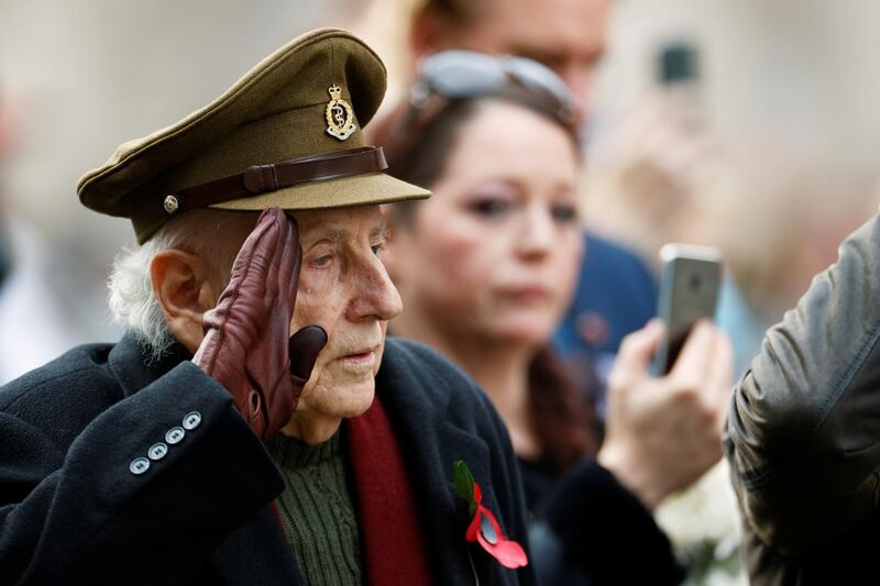 A veteran salutes as he observes two minute's silence at the Cenotaph in Whitehall, London. Reuters
