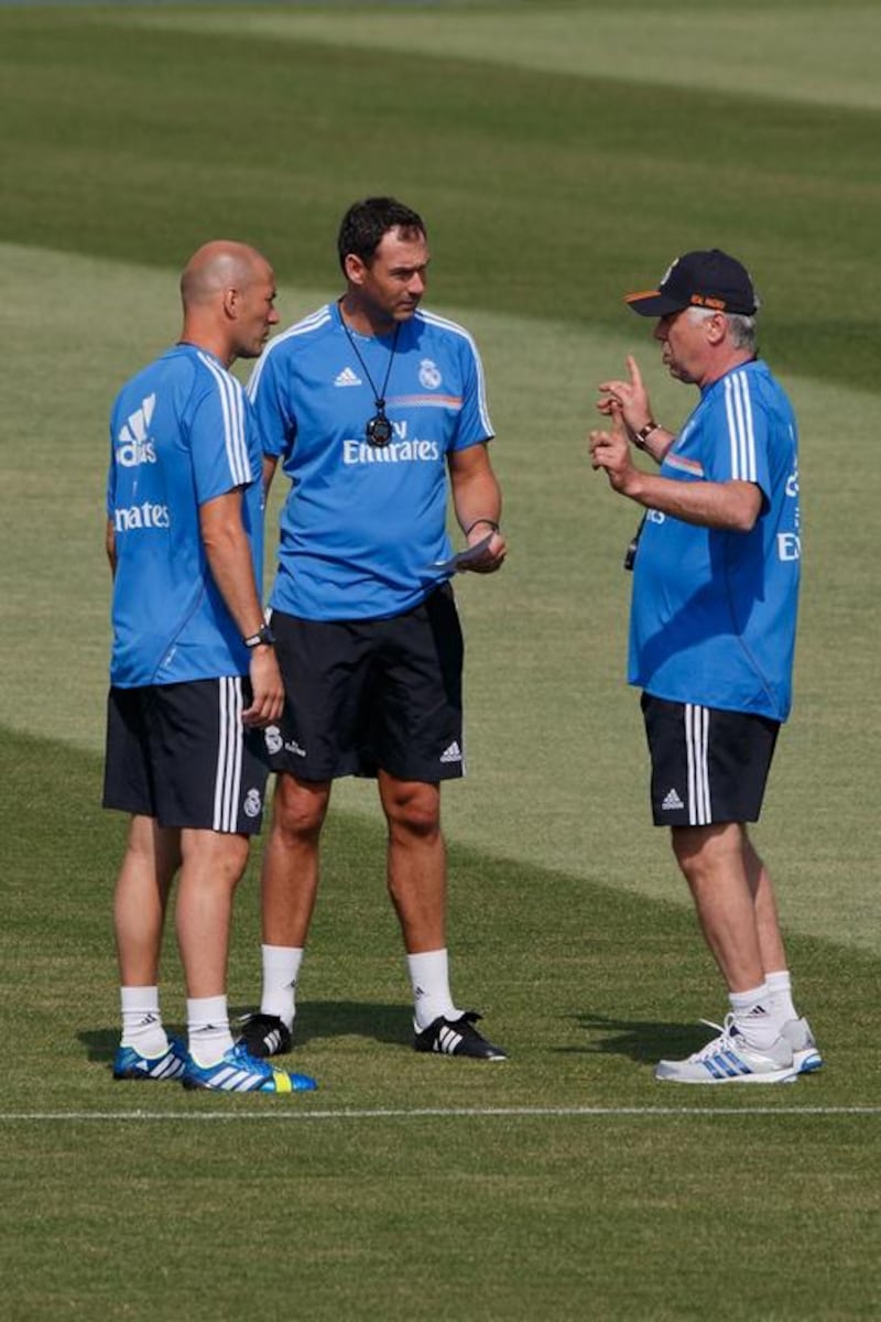 Carlo Ancelotti, has brought Paul Clement, second left, along to Real Madrid, where he works along side the Italian and Zinedine Zidane, left. Gonzalo Arroyo Moreno / Getty Images