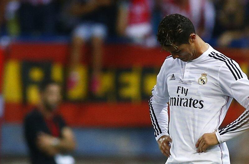 Real Madrid's Cristiano Ronaldo looks down after losing the Spanish Super Cup to Atletico Madrid on Friday night. Sergio Perez / Reuters