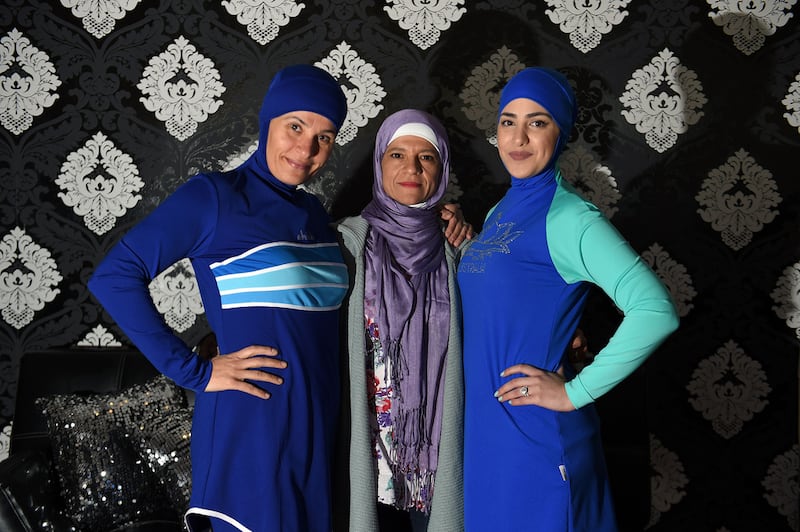 Australian-Lebanese designer Aheda Zanetti, centre, is credited with founding the modern burkini. Photo: Saeed Khan / AFP 