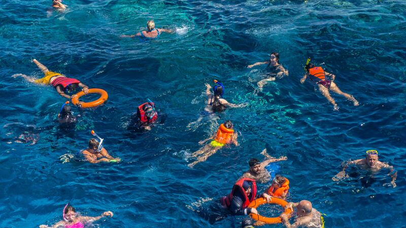 Russian tourists swim at the Egyptian Red Sea resort of Sharm El Sheikh. AFP