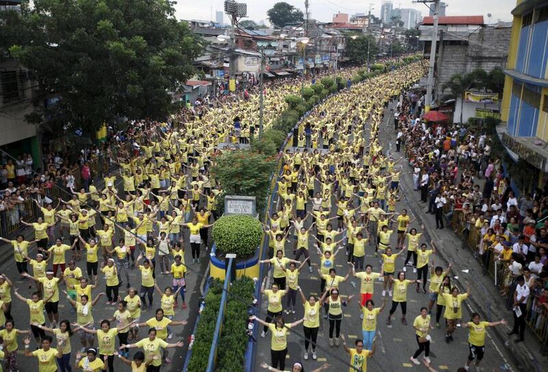 Mandaluyong city achieved the Guinness World Records for the largest Zumba class with an official tally of 12,975 people simultaneously doing Zumba, overthrowing Cebu City’s record of 8,232 people held in October 2014, a Guinness World Records official said. Lorgina Minguito / Reuters