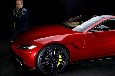 Andy Palmer, CEO of Aston Martin, with the company's Vantage.  Reuters