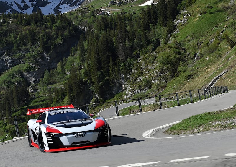 The Vision Gran Turismo cornering at speed on roads near Zurich, Switzerland.