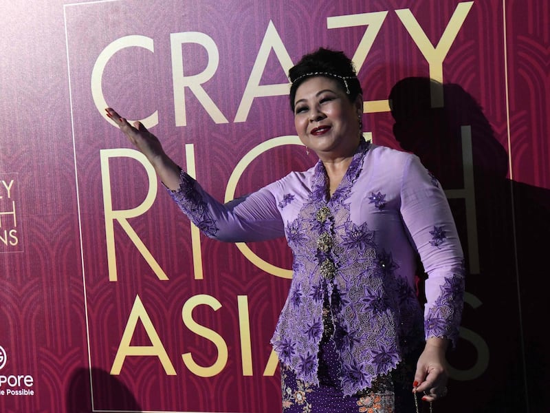 Singaporean actress Koh Chieng Mun posing at the premiere of the film 'Crazy Rich Asians' at the Capitol Theatre in Singapore. Roslan Rahman / AFP