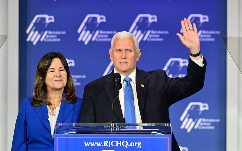 Former US vice president and Republican presidential candidate Mike Pence, with his wife Karen, acknowledges the crowd at the Republican Jewish Coalition (RJC) Annual Leadership Summit. AFP