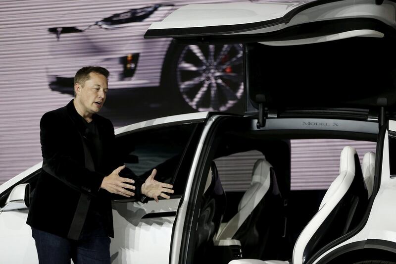 FILE PHOTO: Tesla Motors CEO Elon Musk introduces the falcon wing door on the Model X electric sports-utility vehicles during a presentation in Fremont, California September 29, 2015. REUTERS/Stephen Lam/File Photo/File Photo