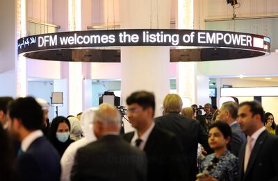 Guests celebrate the start of Empower's trading activity on the Dubai Financial Market. Pawan Singh / The National