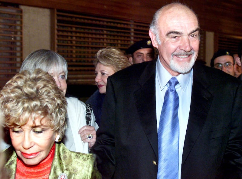 Sean Connery accompanies his wife Micheline to Athinais gallery to open an exhibition of her paintings in Athens, Greece on January 23, 2001. EPA