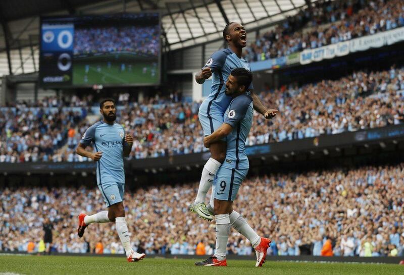 Raheem Sterling celebrates scoring Manchester City’s first goal against West Ham. Carl Recine / Reuters