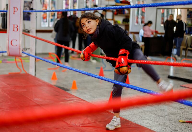 Lamees Abu Al Qomsan, nine, enters the ring. Reuters