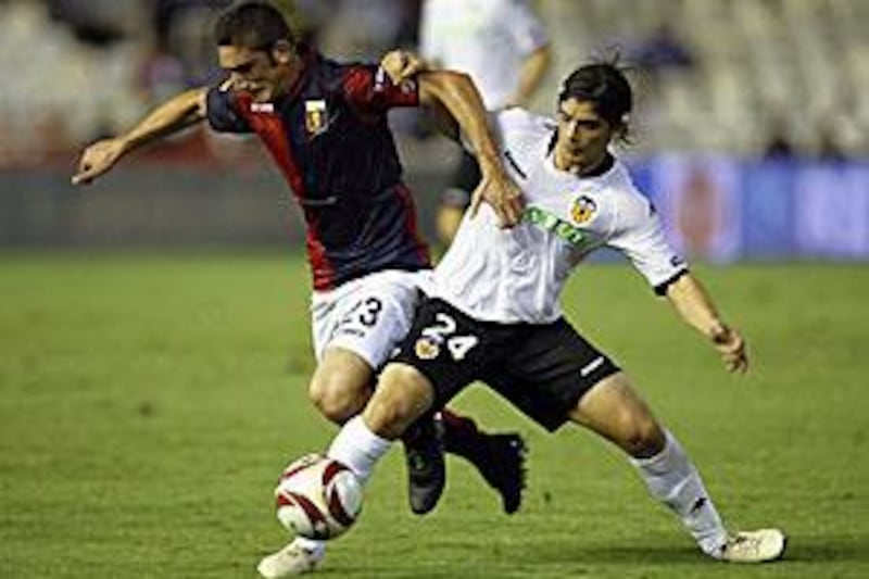 Ever Banega, right, is still just 21-years-old and has time on his hands.