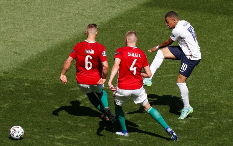 France striker Kylian Mbappe shoots on goal. Reuters