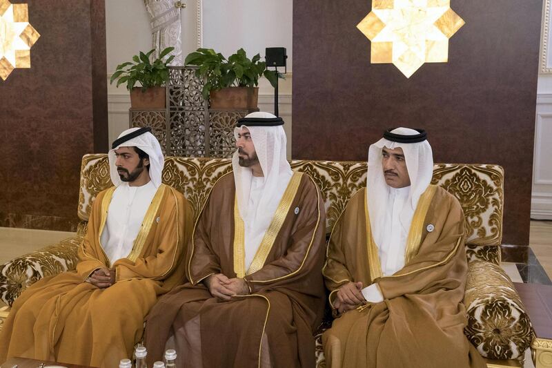 ABU DHABI, UNITED ARAB EMIRATES - July 19, 2018: (L-R) HH Sheikh Khalifa bin Tahnoon bin Mohamed Al Nahyan, Director of the Martyrs' Families' Affairs Office of the Abu Dhabi Crown Prince Court, HE Mohamed Abdulla Al Gergawi, UAE Minister of Cabinet Affairs and the Future, and HE Ahmed Juma Al Zaabi, UAE Deputy Minister of Presidential Affairs, attend a reception held for HE Xi Jinping, President of China (not shown), at the Presidential Airport.

( Mohamed Al Hammadi / Crown Prince Court - Abu Dhabi )
---