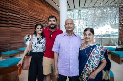 Unnikrishnan Govinad (middle) with his wife and other family members inside the Sustainability pavilion at Expo City Dubai. 