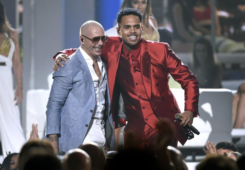 Pitbull, left, and Chris Brown perform at the Billboard Music Awards at the MGM Grand Garden Arena on Sunday, May 17, 2015. Chris Pizzello / Invision / AP
