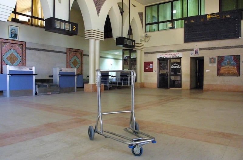 September 9, 2001: A lone luggage trolley stands in front of the abandoned check-in counters at the  Gaza international airport, outside the southern Gaza town of Rafah. The 70-million-dollar airport which opened in November 1998 was closed forced tp close in February 2001 during a conflict with Israel. AFP Photo