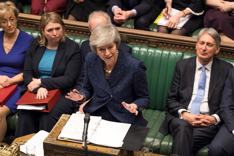 Britain's Prime Minister Theresa May speaks during the regular scheduled Prime Minister's Questions inside the House of Commons in London, Wednesday Dec. 12, 2018. May has confirmed there will be a vote of confidence in her leadership of the Conservative Party, later Wednesday, with the result expected to be announced soon after. (Mark Duffy/UK Parliament via AP)