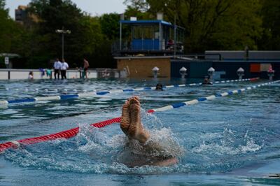 Swimming pools in Berlin have had their water temperature turned down to save energy. AP 