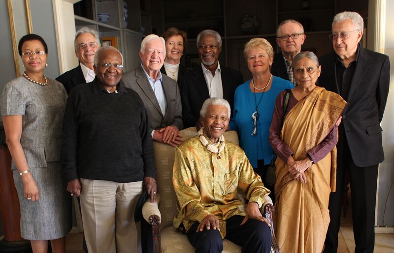 Tutu with The Elders, from left to right, Graca Machel, Fernando Henrique Cardoso, Jimmy Carter, Mary Robinson, Kofi Annan, Gro Brundtland, Martti Ahtisaari, Ela Bhatt, Lakhdar Brahimi and Nelson Mandela (seated) in 2010. Getty Images