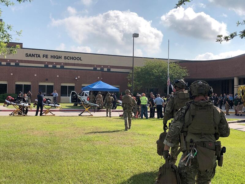 Law enforcement and medical personnel outside Santa Fe High School where a gunman shot numerous people in Santa Fe, Texas. EPA