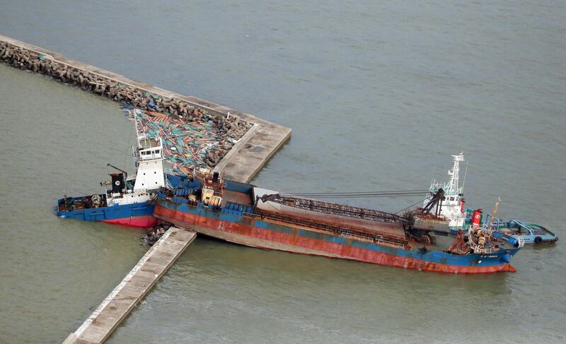 A ship stranded on a seawall a day after powerful Typhoon Jebi hit the area in Nishinomiya, western Japan. EPA