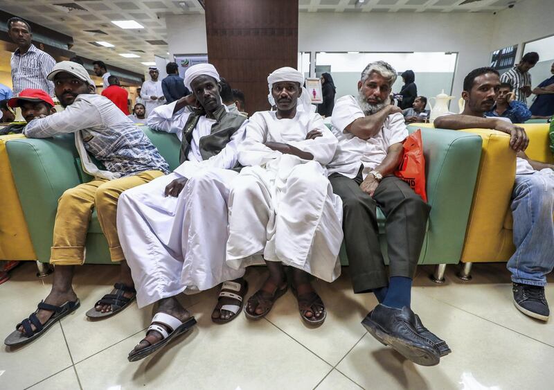 Abu Dhabi, U.A.E., August 26 , 2018.  Visa violators who have been trying to take advantage of the amnesty at the Tas-Heel Centre at Al Raha Mall, patiently wait for their number to be called.
 Victor Besa/The National
Section:  NA
Reporter:  Haneen Dajani