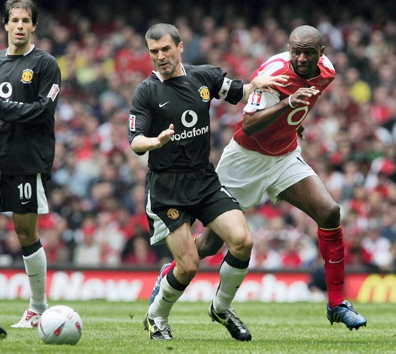 CARDIFF, WALES - MAY 21:  Patrick Vieira of Arsenal and Roy Keane of Manchester United battle for the ball during the FA Cup Final between Arsenal and Manchester United at The Millennium Stadium on May 21, 2005 in Cardiff, Wales.  (Photo by Phil Cole/Getty Images)