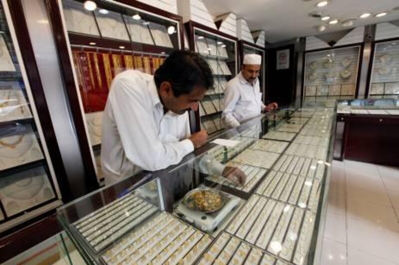 Sharjah, 7th November 2010.  (Right to left) Mohammed Saleem (Owner of Al Masoum Jewellery) and Mohammed Qaisar (Employee) at the Al Masoum Jewellery Shop.  (Jeffrey E Biteng / The National)