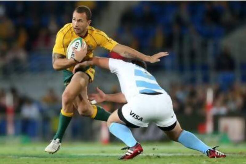 Quade Cooper, left, is a puzzle that Robbie Deans must sort out if he is to continue as Australia's coach.