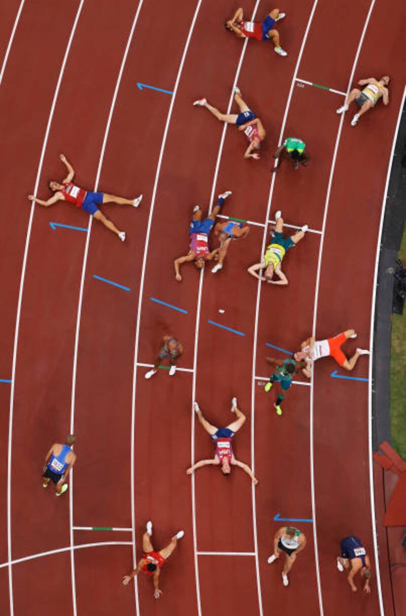 Shattered athletes after the men's decathlon 1500m at Tokyo's Olympic Stadium during the Summer Games on August 5. Getty