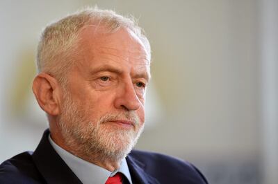 Britain's opposition Labour Party leader, Jeremy Corbyn, poses for a photograph as he prepares to meet with leaders of Britain's other political parties to discuss options for Brexit, in Portcullis House, central London on August 27, 2019. Labour leader Jeremy Corbyn will on Tuesday attempt to bridge deep divisions with other opposition parties on how to avoid Britain crashing out of the EU on October 31. Corbyn said he would "do everything necessary" to stop a no-deal Brexit, following leaked official warnings that this could lead to food, fuel and medicine shortages.
 / AFP / Daniel LEAL-OLIVAS
