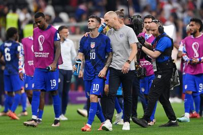 USA coach Gregg Berhalter speaks with Christian Pulisic after the 0-0 draw with England. Getty Images