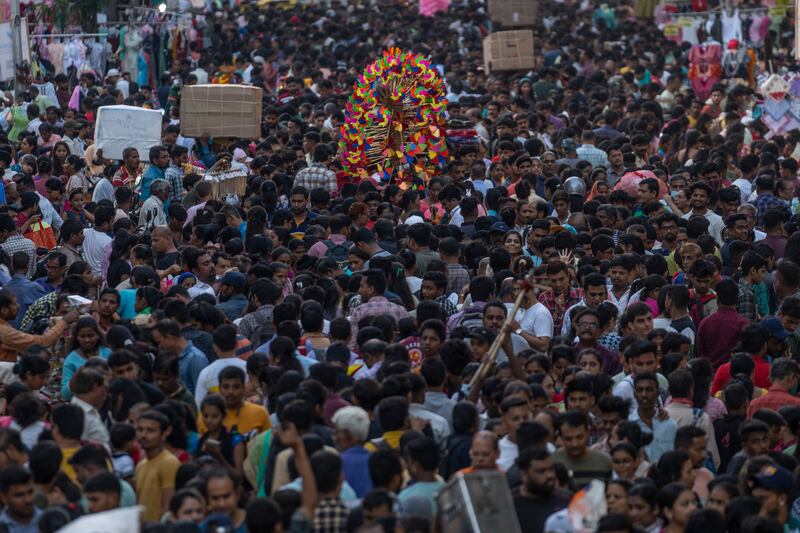 People shop in Mumbai ahead of Diwali, one of Hinduism's most important festivals, dedicated to the worship of the goddess of wealth Lakshmi. AP