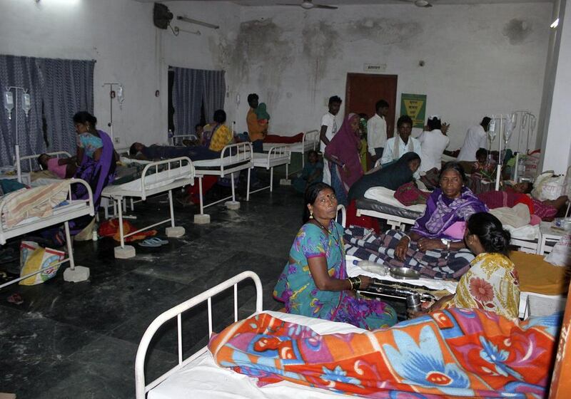 Women who underwent botched sterilisation surgeries at a government 'camp' receive treatment at a district hospital in Bilaspur, in the eastern Indian state of Chhattisgarh on November 10, 2014. Thirteen women have died of toxic shock after the surgeries. Reuters