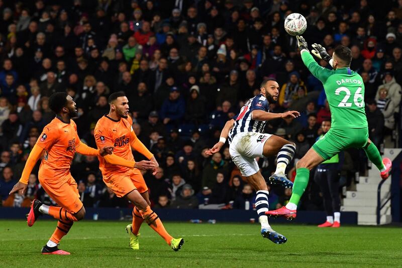 Newcastle United goalkeeper Karl Darlow saves a chance from West Bromwich Albion's Matt Phillips. AFP