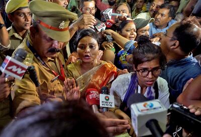 Rakhi Singh, Sita Sahu and Laxmi Devi leave the Gyanvapi mosque in Varanasi, India, May 14, 2022. Reuters