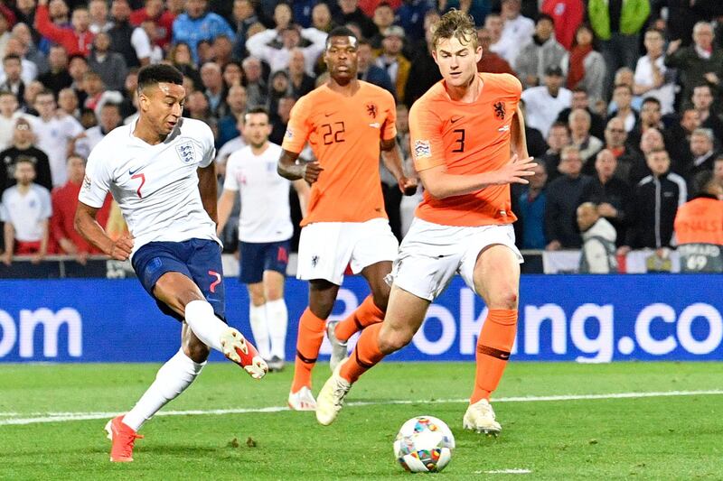 Lingard, left, scores his side's second goal before his goal was disallowed for offside following a VAR review. AP Photo