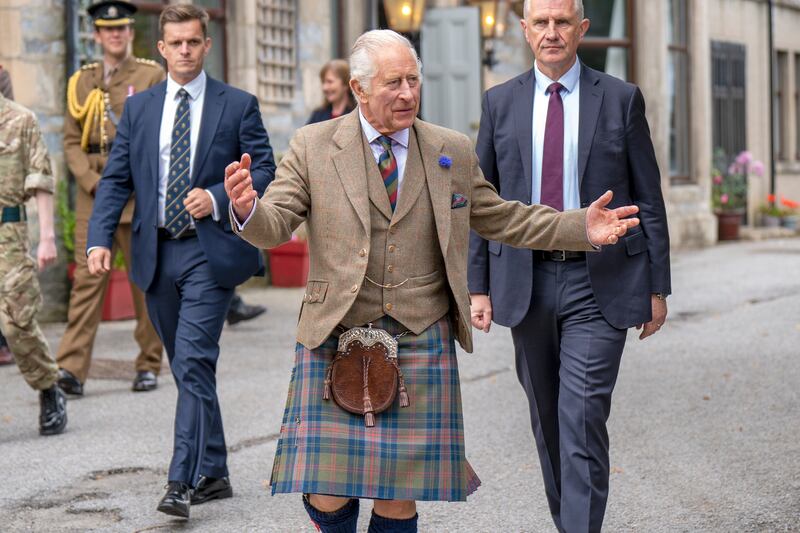 King Charles walks down a street in Tomintoul. Getty Images