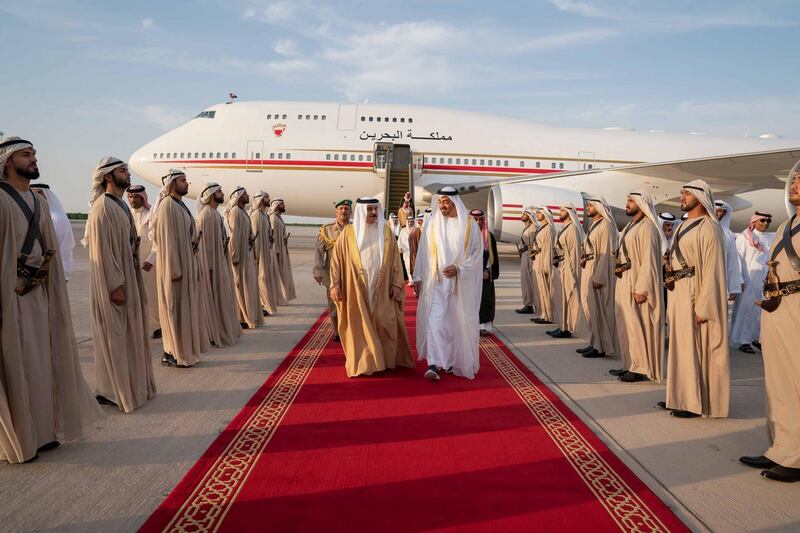 ABU DHABI, UNITED ARAB EMIRATES - May 23, 2019: HH Sheikh Mohamed bin Zayed Al Nahyan Crown Prince of Abu Dhabi Deputy Supreme Commander of the UAE Armed Forces (center R), receives HM King Hamad bin Isa Al Khalifa, King of Bahrain (center L), at Al Bateen Airport. 

( Mohamed Al Hammadi / Ministry of Presidential Affairs )
---