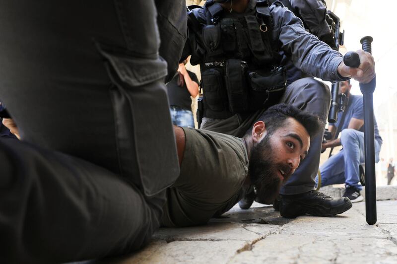 Israeli security forces detain a Palestinian protester during a demonstration at Damascus Gate just outside Jerusalem's Old City. Reuters