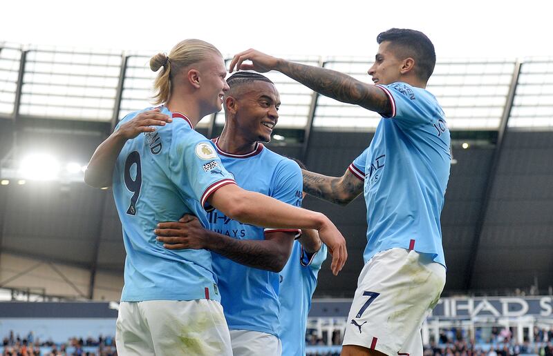 Manchester City's Erling Haaland celebrates with teammates after scoring. EPA