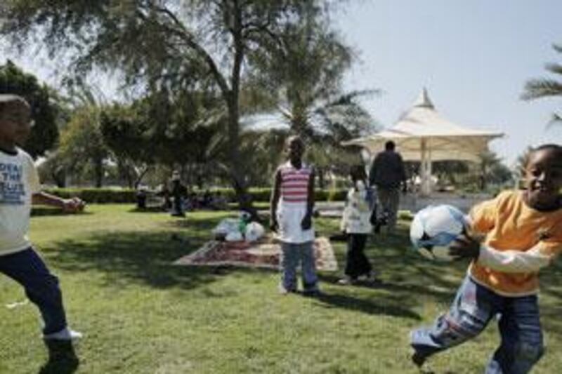 Children play in a park in Abu Dhabi. Perceptions of safety among the survey's respondents fell sharply when it came to family members.