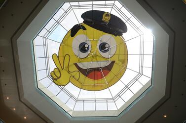 A smiley face has been painted onto the dome of the Muraqqabat Police Station in Dubai in a bid to promote happiness. Courtesy Dubai Police