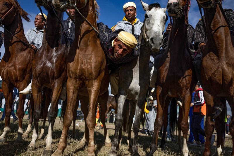 Riders from the Beni Arous tribe attend a traditional equestrian game of 'Mata' in Morocco's Larache province. AFP